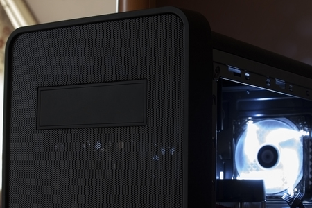 Modern computer case with white fan