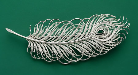 Silver filigree peacock feather brooch; intricate metalwork, artistic detail, elegant designの素材
