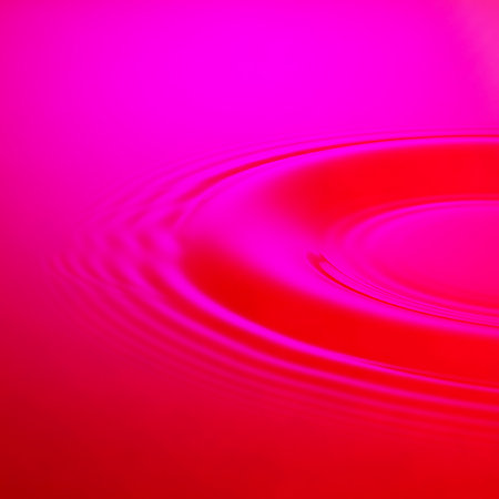 Abstract design featuring ripple texture in pink and red. Liquid fluid motion creates captivating pattern. Perfect as design element and stylish backdrop for modern presentations.の素材