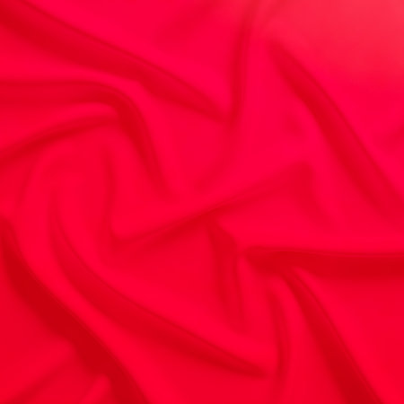 Luxurious soft red silk fabric background with smooth elegant folds. Red gradient color silk material design for elegant wallpaper background backdrop presentationの素材