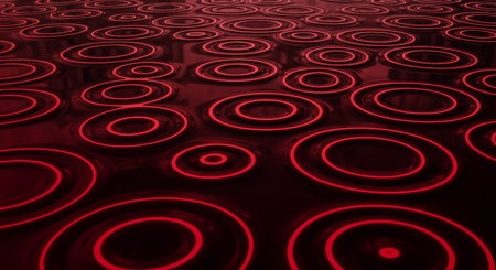 Surface ripple effect with circular wave patterns creating abstract scene. Circles and rings in red color concept. Shiny texture and surface with wave designsの素材