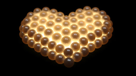Luminous heart shape crafted from glowing white pearls, radiating a soft warm light in the dark. Elegant and romantic pattern.の素材