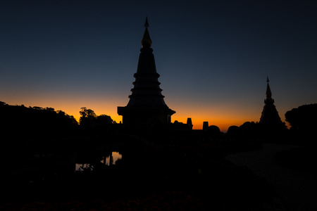 Beautiful Temple silhouette in Thailand, Pagoda on Inthanon national park at Chiang mai, Thailand.の写真素材