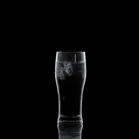 Glass of water isolated on black backgroundの写真素材