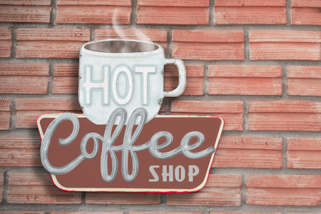 Coffee Shop logo for cafe business on wall background.の写真素材