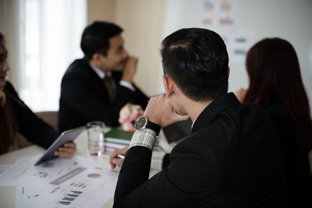 Asian businessman being business thinking. in conference room is discussing together talk about Report, Sales, Marketing, Conceptの写真素材