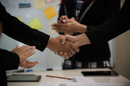 A group of Asian Business handshake of congratulations on meeting the business achieve success.の写真素材