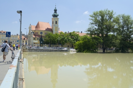 Carmelite Church at Flooding Raba River in Gyor, Hungaryのeditorial素材
