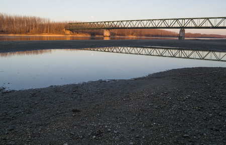 VAMOSSZABADI, HUNGARY - FEBRUARY 13, 2014: The 361 meter long Vamosszabadi Bridge over Danube River is an important river crossing between Hungary and Slovakia.のeditorial素材