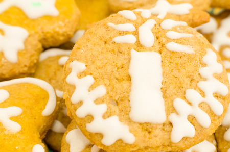 Brown Christmas Honey Cookie with White Candle Decoration Closeupの写真素材