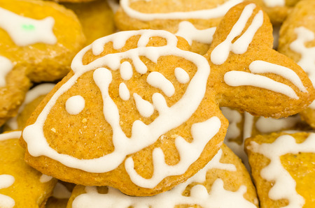 Brown Christmas Honey Cookie with White Fish Decoration Closeupの写真素材