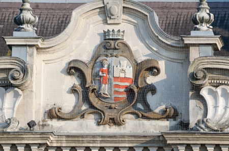 Coat of Arms of the City of Gyor on the Facade of the Town Hallの写真素材