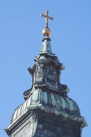 Baroque Church Tower with Clear Blue Sky Verticalの写真素材