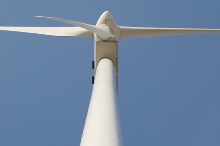 White Wind Turbine on Blue Sky Closeup