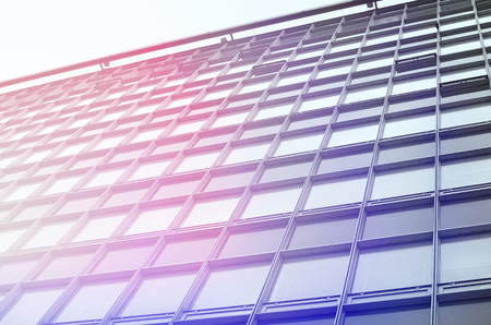 Office Building Facade with Many Identical Windowsの写真素材