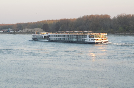 Tourist Ship on the Danube River Early Morningの写真素材