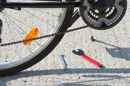 Black Bicycle Closeup with Cone Spanner Wrench Toolsの写真素材