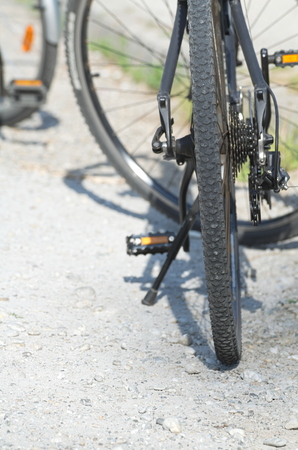 Black Cross Bicycle on Dirt Road Daytime Closeupの写真素材