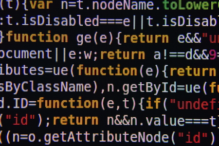 Yellow Red and White Program Source Code Segment on Black Screen Closeupの写真素材