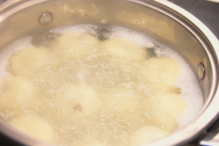 Cooking Plum Dumplings in Hot Water Closeupの写真素材