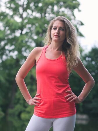 Portrait of a Sporty Woman in her Thirties in the Parkの写真素材