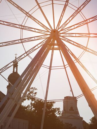 Backlit Ferris Wheel Closeup with Light Leaks in GyÅr, Hungaryの写真素材