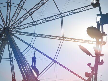 Backlit Ferris Wheel Closeup with Light Leaks in GyÅr, Hungaryの写真素材