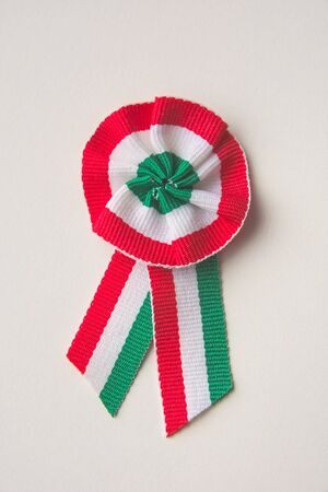 Red White Green Hungarian Cockade on White Background Closeupの写真素材