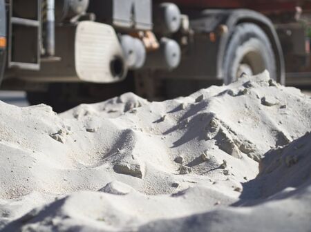 Piled up Fine White Sand Construction Material with Truck