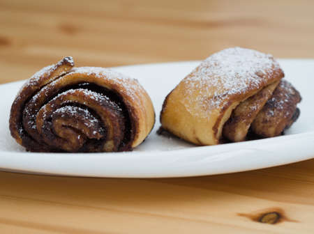 Delicious Cocoa Snails on a White Plate Closeupの写真素材