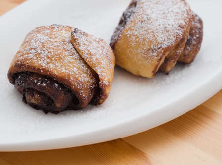 Delicious Cocoa Snails on a White Plate Closeupの写真素材