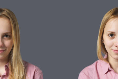 Portrait of a Blonde Girl on Gray Background Split Face Twins Conceptの写真素材