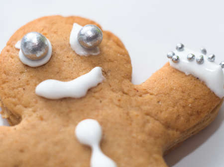 Smiling Tasty Brown Gingerbread Man Macro Closeupの写真素材