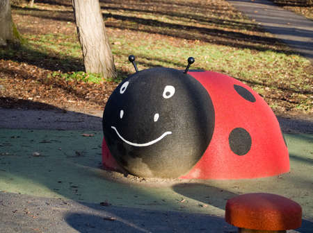 Ladybug Rider Playground Toy in the Parkの写真素材