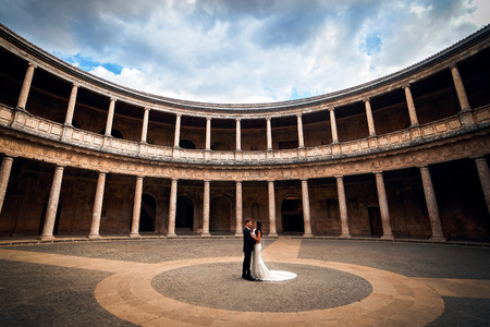 Beautiful romantic couple at a wedding in Alhambra. Alhambra wedding ceremony.の写真素材