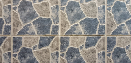 Stone wall rustic texture background. Textured stone wall closeup.の写真素材