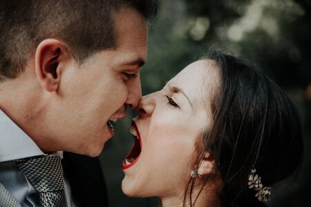 Face to face yelling wedding couple.の写真素材