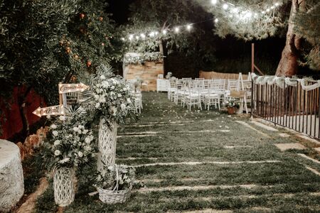 Night wedding outdoor decoration. Decorated meadow for wedding ceremony.の写真素材