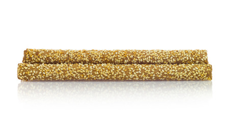 Crunchy Bread Sticks With Sesame on Whiteの写真素材