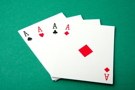 A hand of four aces.