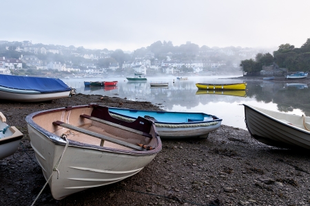 The tide is on its way in on a misty morning in Devon.  Taken in Noss Mayo looking towards Newton Ferrers.の写真素材
