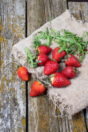 on old strawberry slices on fabricの写真素材