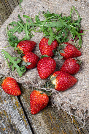 on old strawberry slices on fabricの写真素材
