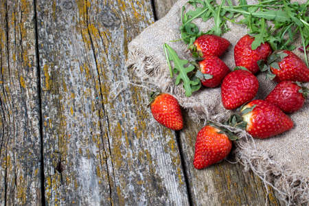 on old strawberry slices on fabricの写真素材