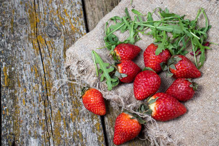 on old strawberry slices on fabricの写真素材