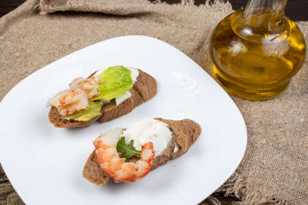 Mediterranean sandwich with bruschetta cream cheese shrimpの写真素材