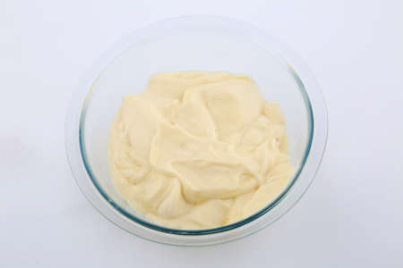 mayonnaise sauce in a glass bowlの写真素材