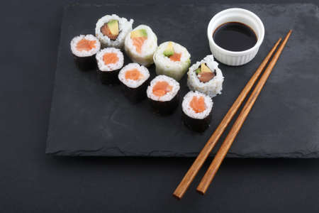 sushi makis with sticks and soy sauceの写真素材