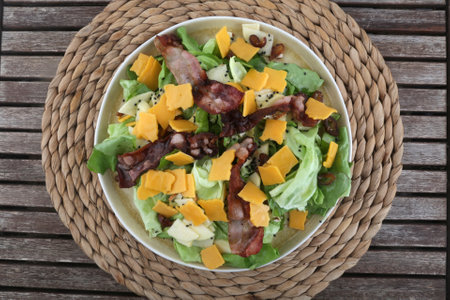 lettuce tasty salad with bacon and cheddarの写真素材