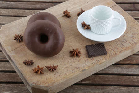 chocolate donuts as sweet temptation for breakfast